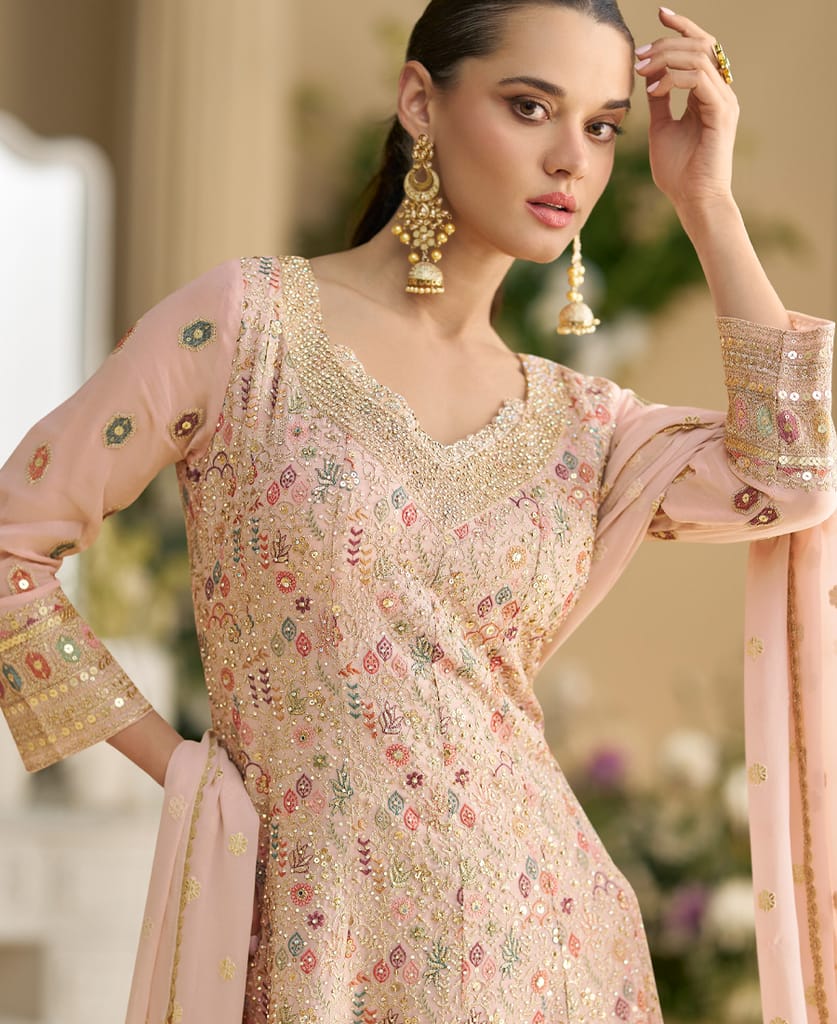heavy wedding wear pink georgette peplum style suit for women