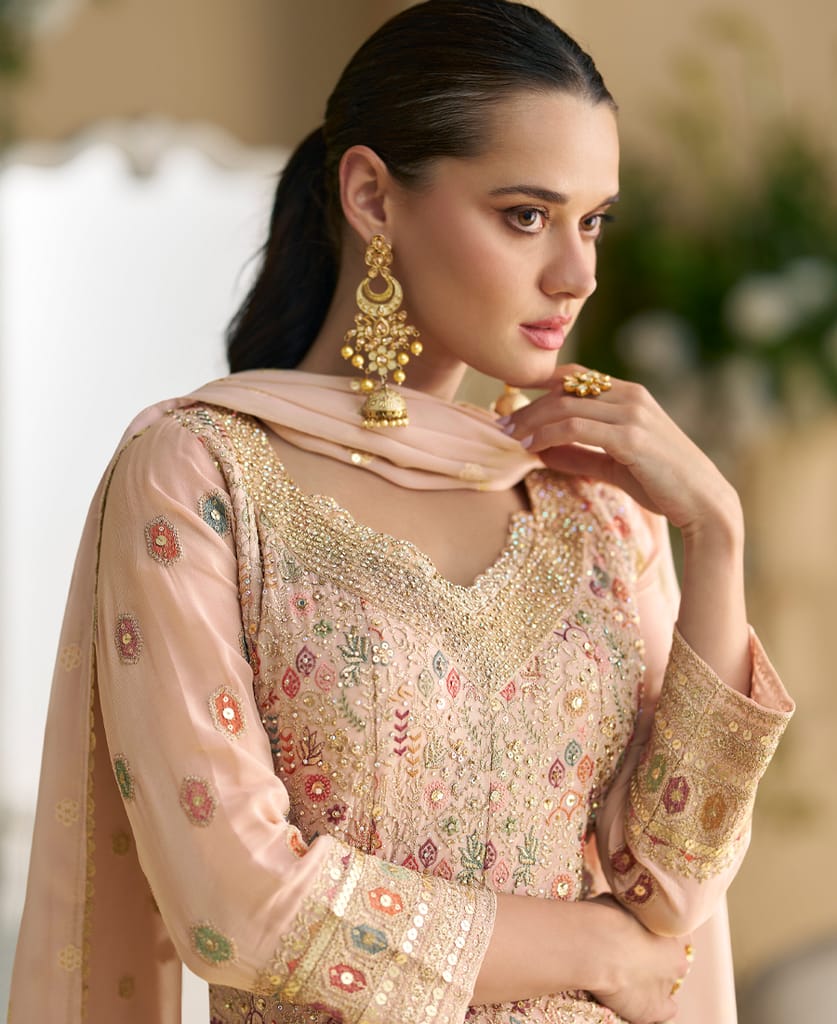 heavy wedding wear pink georgette peplum style suit for women