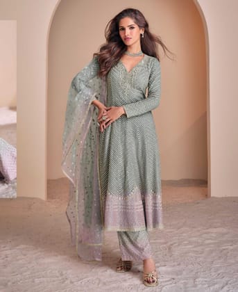 designer heavy embroidered green georgette peplum suit for women