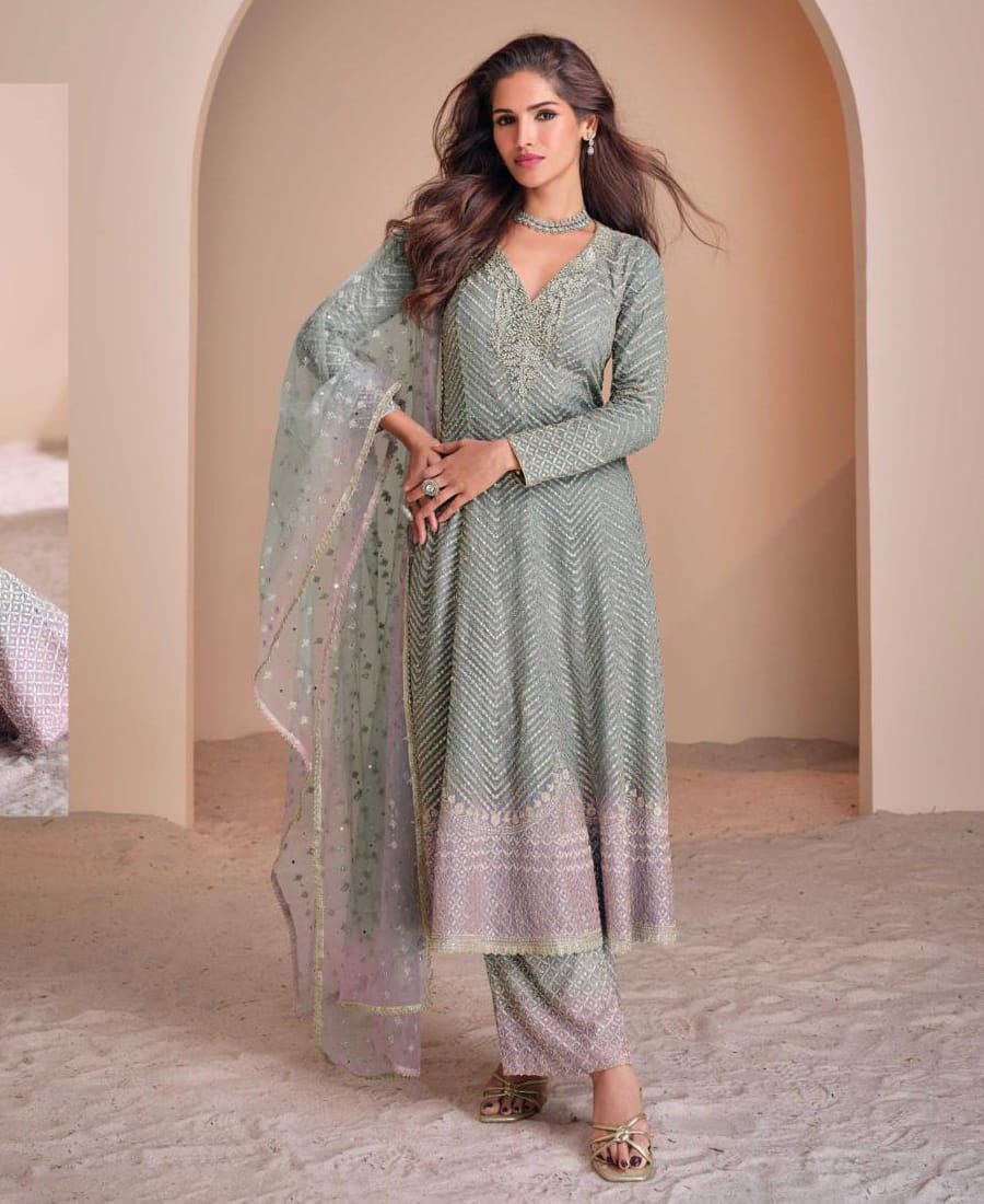 designer heavy embroidered green georgette peplum suit for women