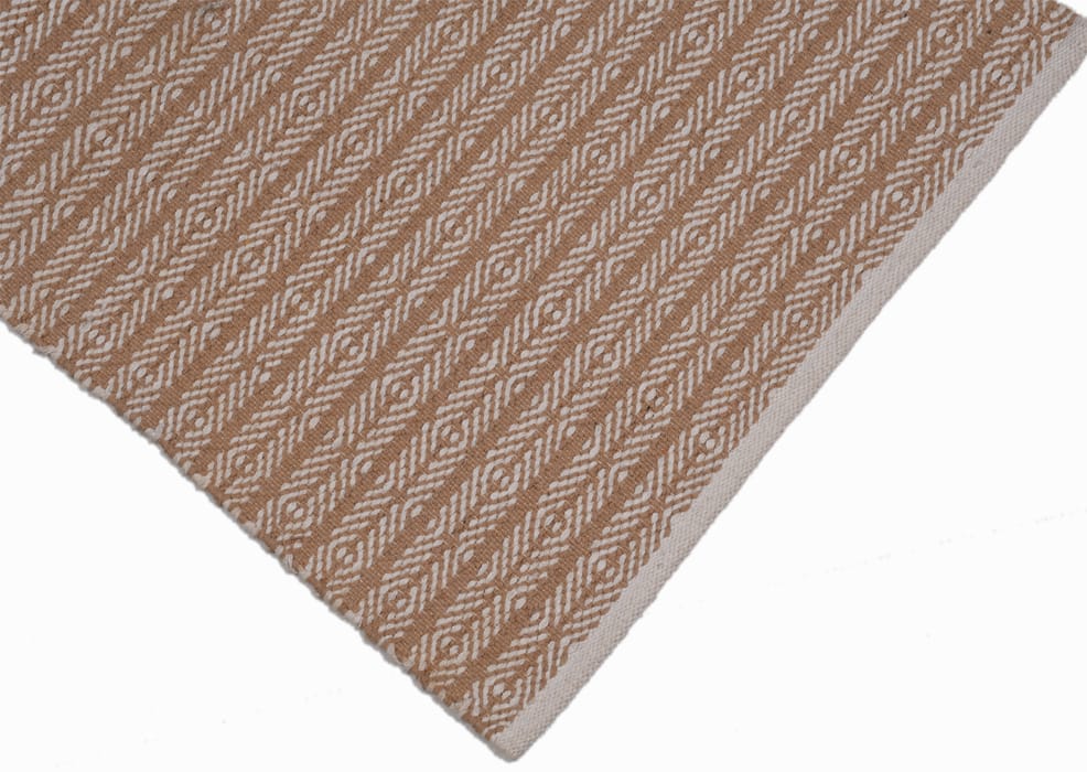 Miki This durrie By Woven Legacy Exudes A Luxurious Vibe.