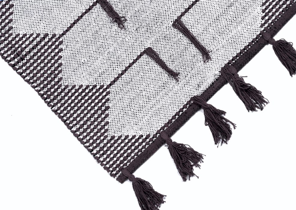 Sheer Handwoven Using Traditional Flatweave Techniques.