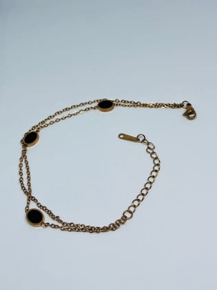 Elegant Gold-Toned Double Chain Bracelet with Black Oval Charms