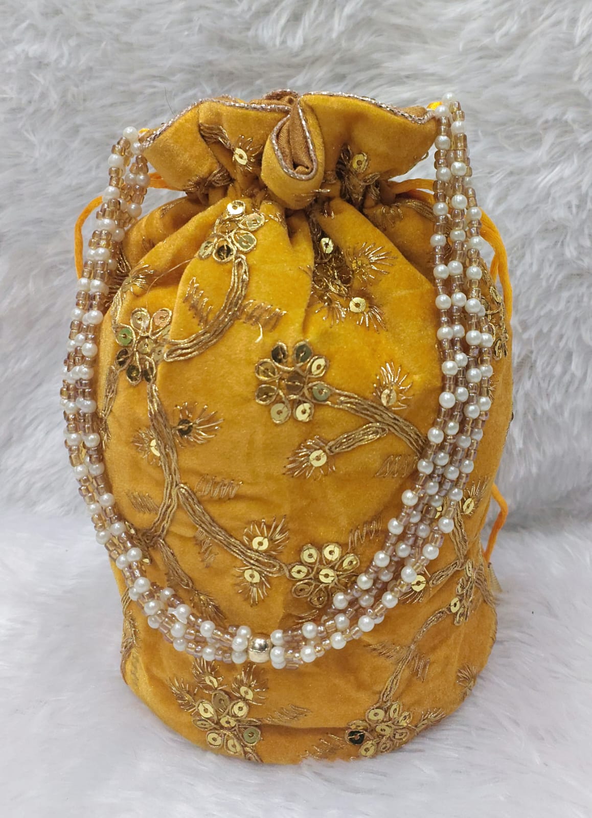 Traditional Mustard Velvet Potli Bag with Zari Embroidery & Pearl Handle