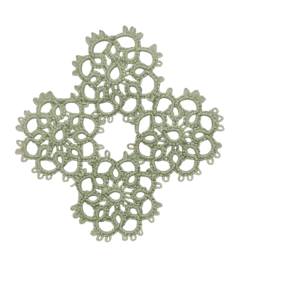Handcrafted Lacework Features Four Interconnected Circular Motifs