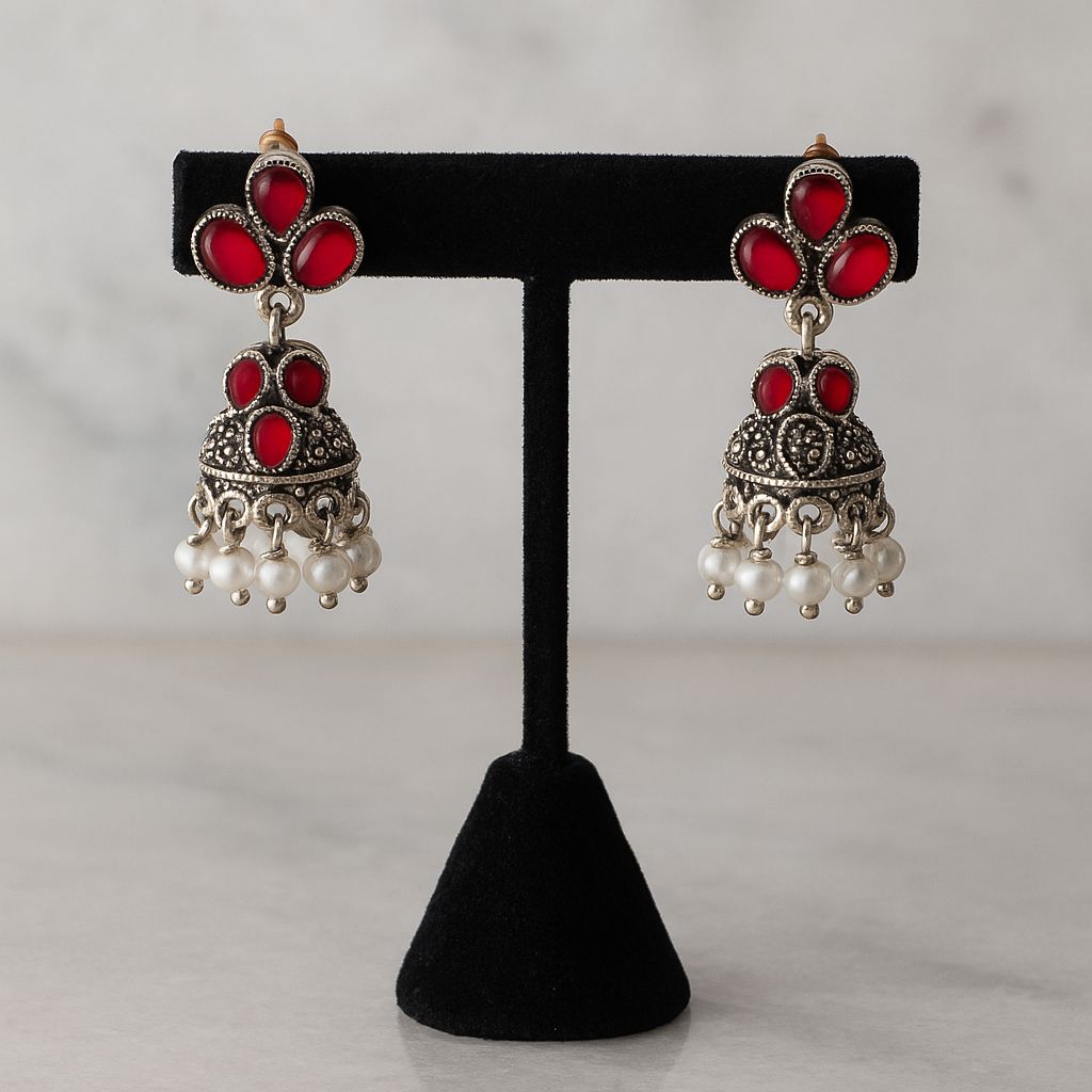 Antique Silver-Plated Oxidised Jhumka Earrings with Red Stone Embellishments