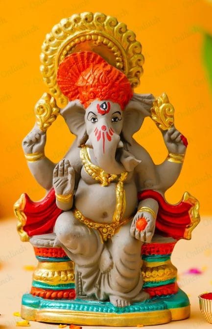 Exquisite Seated Lord Ganesha Idol with Red & Gold Accents