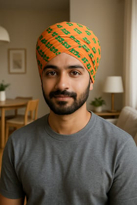 Vibrant Orange Turban with Green Geometric Pattern Vibrant Orange Turban with Green Geometric Pattern