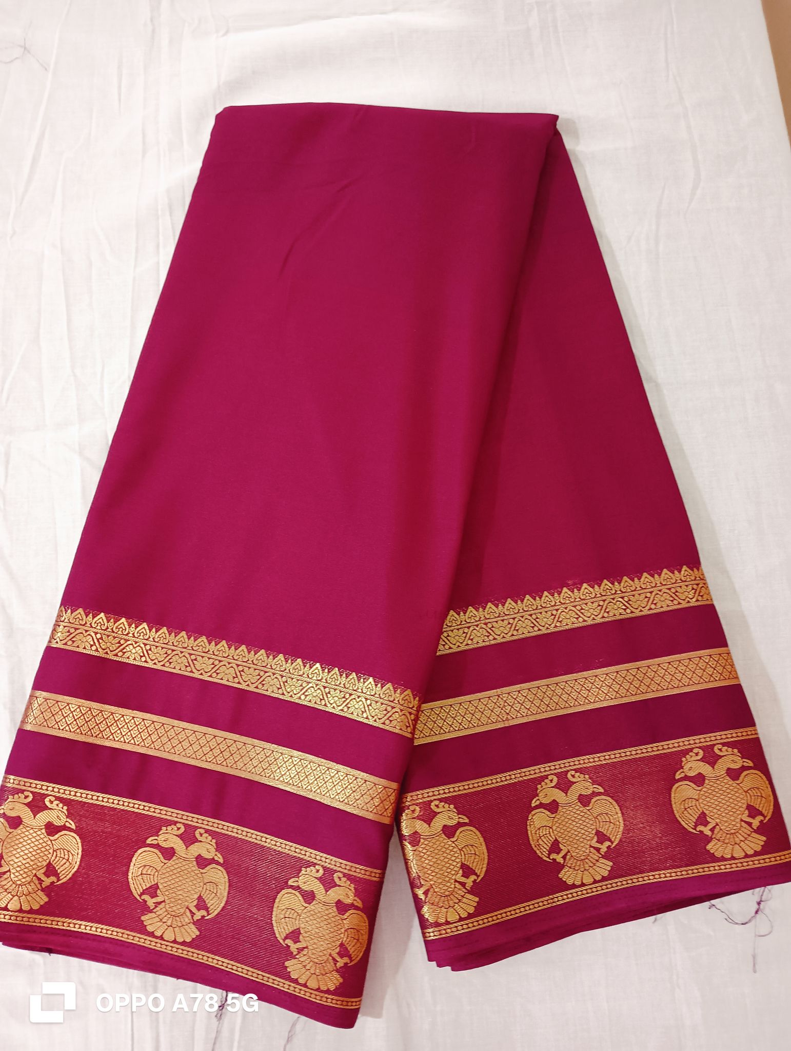 Exquisite Marun Crape Silk Saree with Golden Border