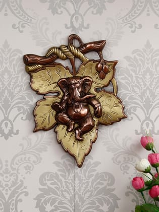 Golden Finish Lord Ganesha On Creative Leaf Metal Wall Hanging
