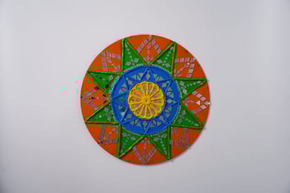 Lippan art, also known as mud and mirror work, which is a traditional mural craft