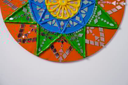 Lippan art, also known as mud and mirror work, which is a traditional mural craft