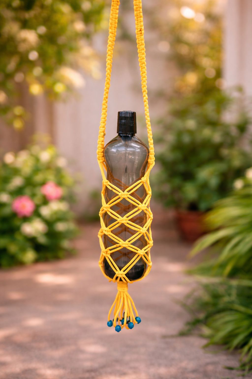 Handmade Yellow Macrame Water Bottle Holder with Adjustable Strap
