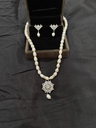White Hyderabad Pearl Necklace Set with Clear Pendant