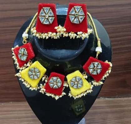 Red and Yellow Velvet Fabric Kundan Necklace Set with Pearl Embellishments