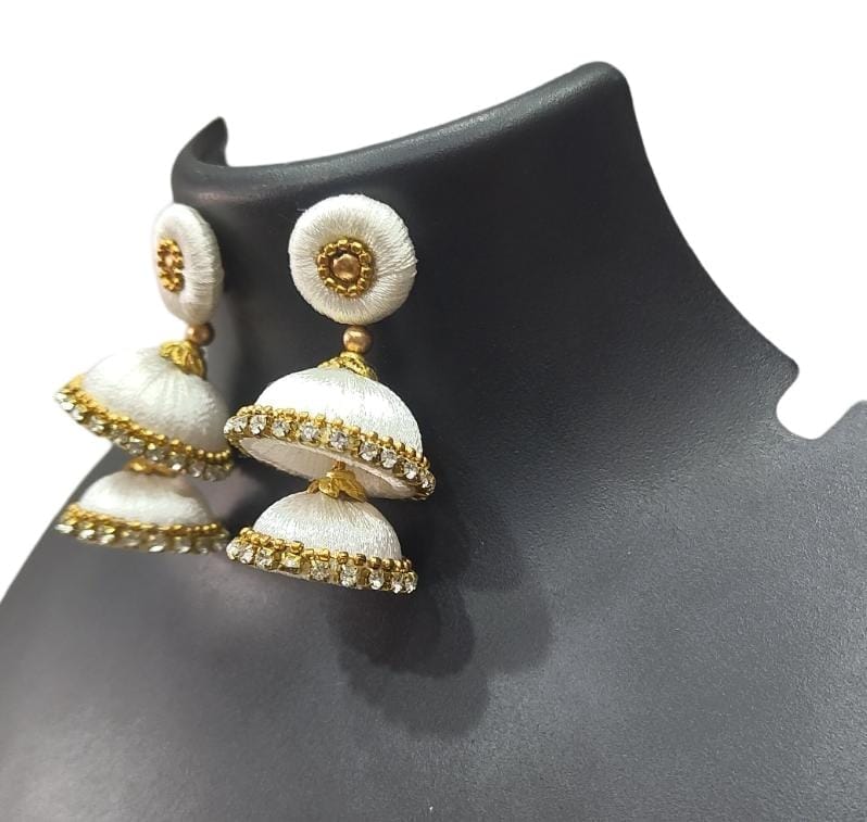 White Silk Thread Jhumka Earrings with Stone and Pearl Embellishment