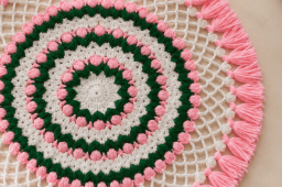 Hand-Crocheted Floral Placemat in Pink, Green, and White - 30cm