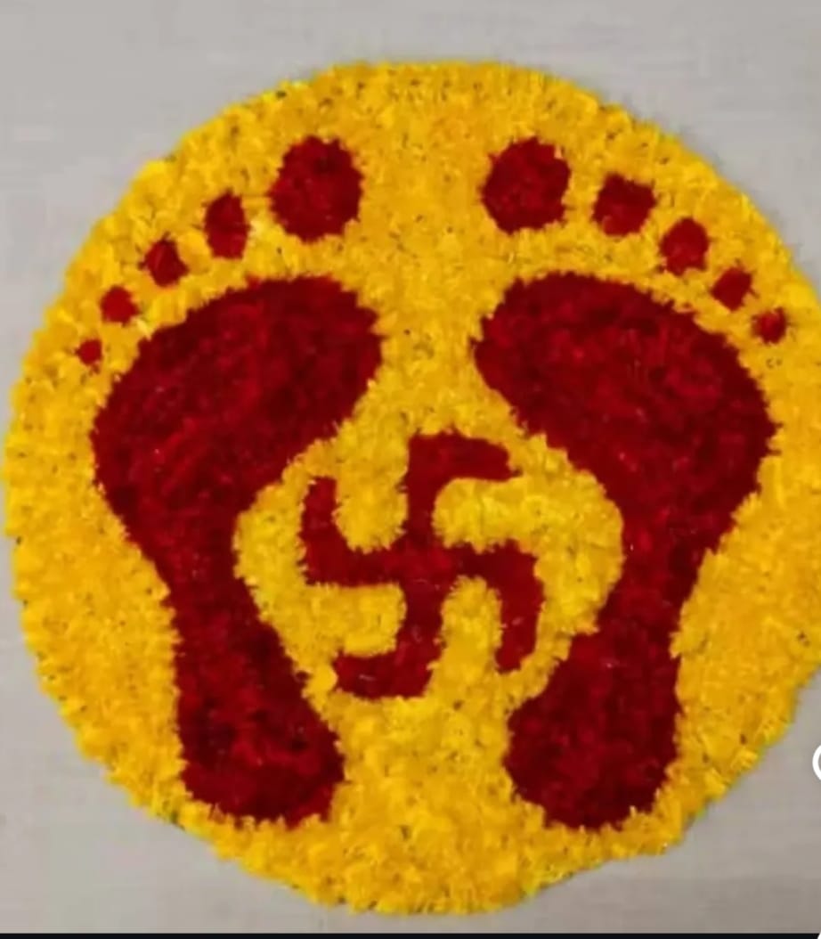 Artificial Marigold Flower Laxmi Charan and Swastik Rangoli Mat