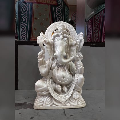Lord Ganesha sitting marble stone statue