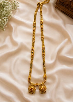 Traditional Dual Vati Long Mangalsutra with Red & Green Stones Traditional Dual Vati Long Mangalsutra with Red & Green Stones