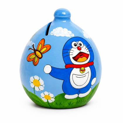 Aamadhiya Eco Studio Hand-Painted Doraemon Clay Piggy Bank | Eco-Friendly Terracotta Gullak for Kids | Traditional Money Saving Bank | Cute Kids Room & Study Table Décor | Birthday Gift