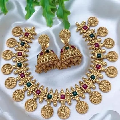 Traditional Gold-Plated Lakshmi Coin Necklace & Jhumka Earring Set with Red & Green Stones Traditional Gold-Plated Lakshmi Coin Necklace & Jhumka Earring Set with Red & Green Stones
