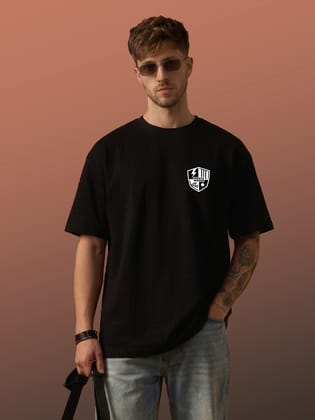 The Retro India Black Oversized Cotton T-Shirt for Men with Minimal NXR Logo | Premium Streetwear Solid Tee | Soft Breathable Fabric Casual Trendy Loose Fit Designer Wear The Retro India Black Oversized Cotton T-Shirt for Men with Minimal NXR Logo | Premium Streetwear Solid Tee | Soft Breathable Fabric Casual Trendy Loose Fit Designer Wear