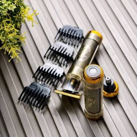 3-in-1 multifunctional grooming kit T-blade trimmer for beard and moustache styling Foil-style shaving attachment Nose hair trimming attachment Multiple guide combs USB charging cable Cleaning brushes included Stylish gold-finish body