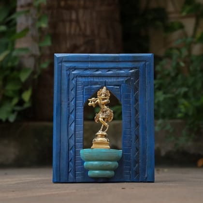 Handcrafted Lord Krishna Brass Idol With Distressed Wooden Frame Handcrafted Lord Krishna Brass Idol With Distressed Wooden Frame
