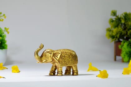 Brass Elephant Showpiece Statue (Color - Golden, Size - 4H * 5.5L * 2.25B) by Snova Enterprises Brass Elephant Showpiece Statue (Color - Golden, Size - 4H * 5.5L * 2.25B) by Snova Enterprises