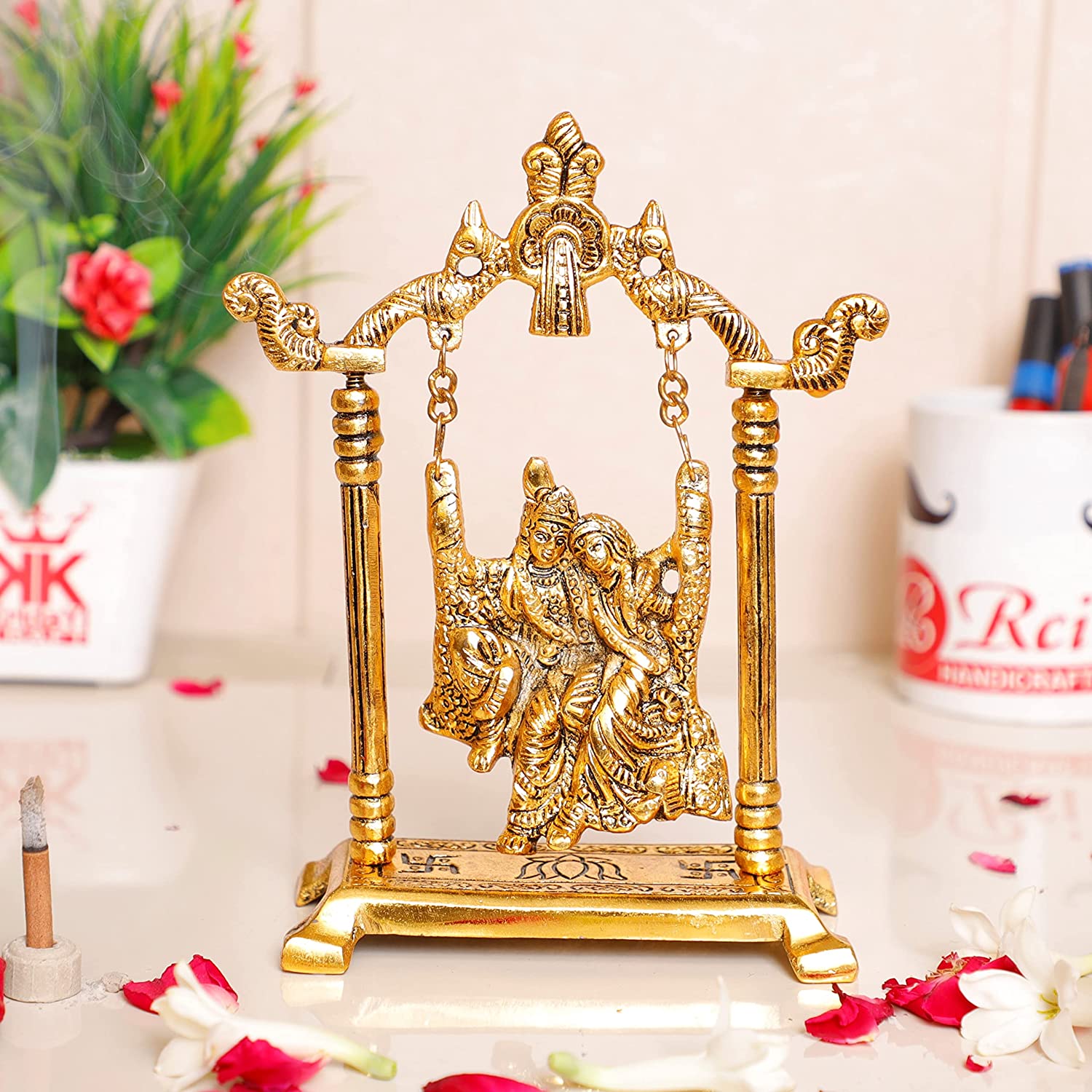 DreamKraft Radha Krishna on Swing Jhula Metal Statue Gold Plated