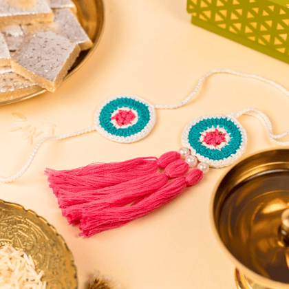 Pastel Crochet Rakhi & Lumba Set-1 Rakhi + 1 Lumba Set