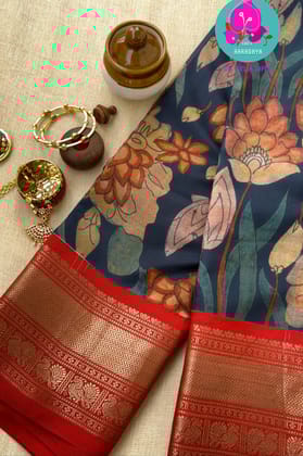 Blue kalamkari printed saree with red border