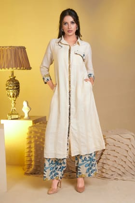 Beige pure cotton lurex textured kurta with hand sequence on the placket teamed with printed pants-M