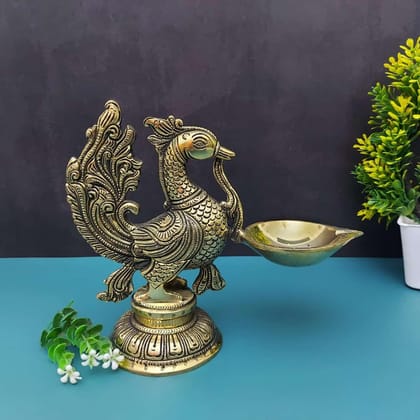 Brass Peacock Single Wick Diya - 7.5" Height | Exquisite Brass Diya with Peacock Design Brass Peacock Single Wick Diya - 7.5" Height | Exquisite Brass Diya with Peacock Design