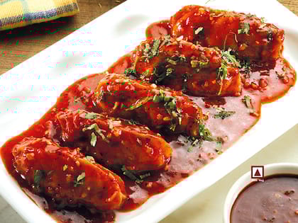 Chicken Himalayan Pan Fried Momo In Tomato Garlic Sauce(Non Spicy)