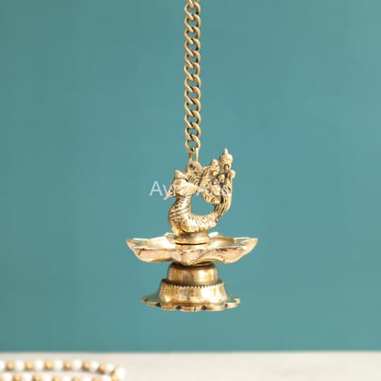 Brass Hanging Peacock Diya Lamp for Puja 7 Oil Wick with Chain for Home Decoration - 3 Inch Length Brass Hanging Peacock Diya Lamp for Puja 7 Oil Wick with Chain for Home Decoration - 3 Inch Length