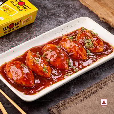 Chicken Himalayan Pan Fried Momo In Schezwan Sauce (Spicy)