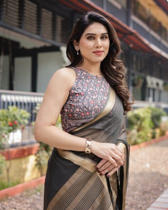 Ethereal Black Plain Chiffon Saree with Gold Zari Border, Floral Printed Blouse & Tassel Detailing-Regular