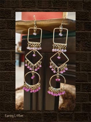 Long handmade earrings with three different beads of pink colour