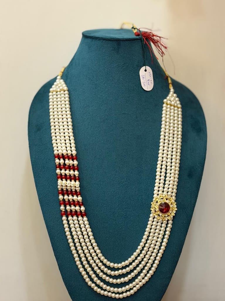rajwadi dulha haar featuring royal round side brooch with maroon stone