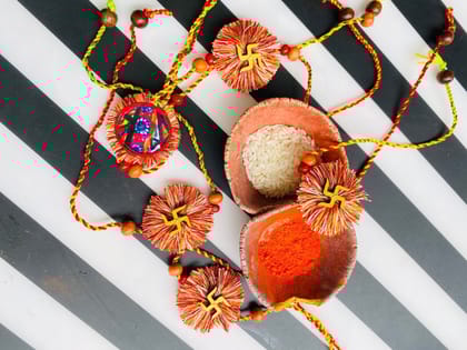 A bright day Swastik Rakhi - 1 piece