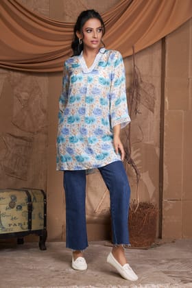 Blue Viscose digital print kurti with pearl and stone work on neck and sleeve-M
