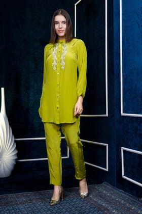 Green crepe kurta with intricate pearl embroidery teamed with straight pants-M