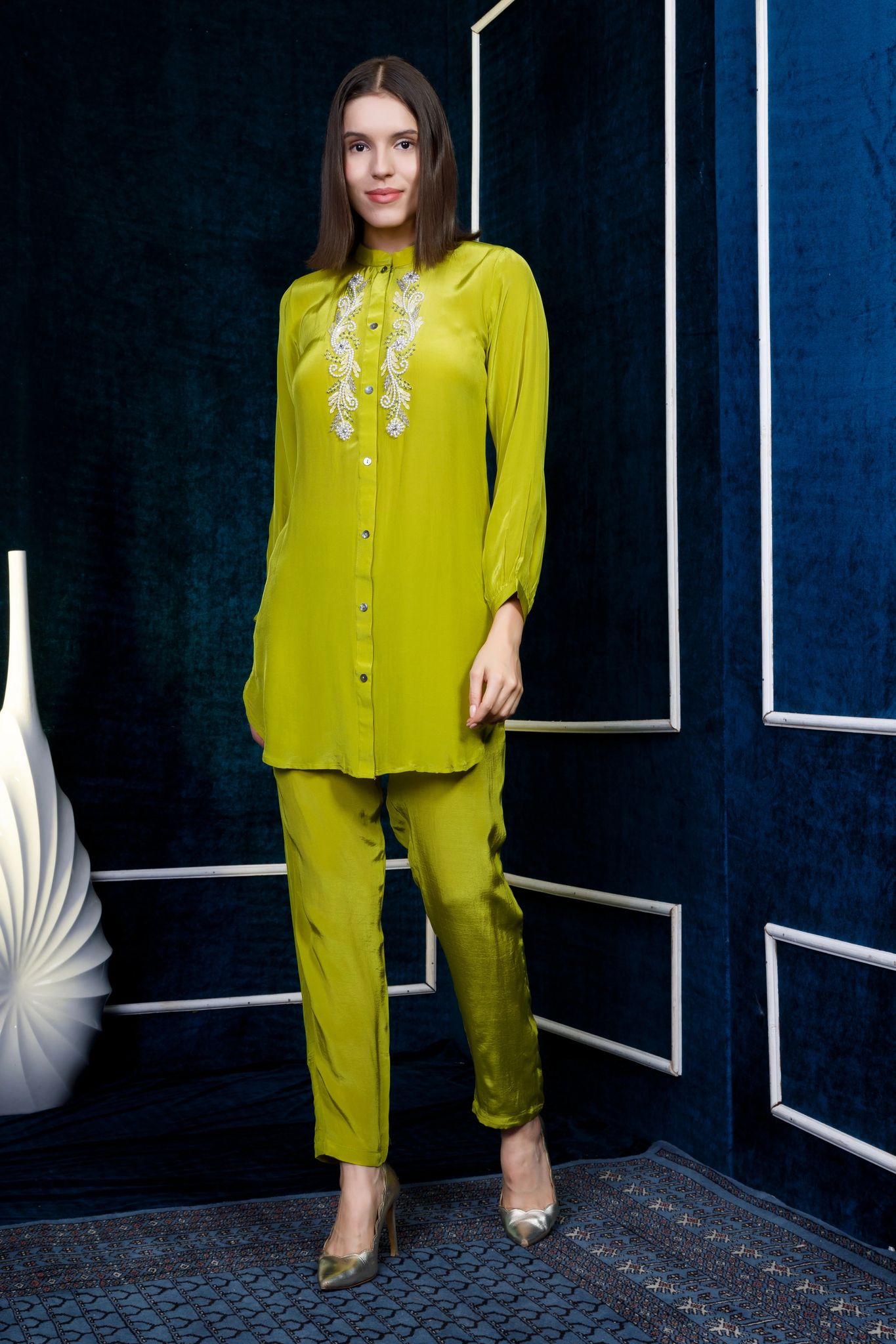 Green crepe kurta with intricate pearl embroidery teamed with straight pants-M
