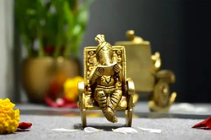 Lord GANESHA BOOK READING AT CHAIR for Home Décor  by Snova Enterprises