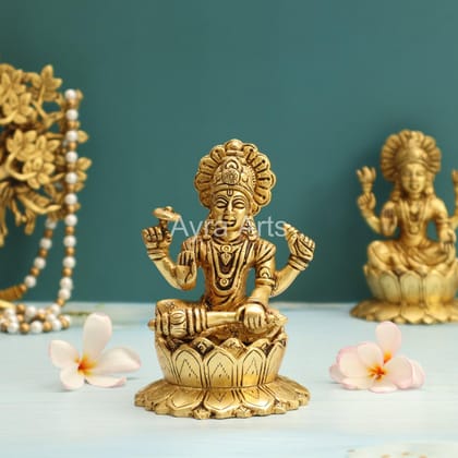 Lord Vishnu Murthi Seated on Lotus In Brass - 5.2 Inch Height Lord Vishnu Murthi Seated on Lotus In Brass - 5.2 Inch Height