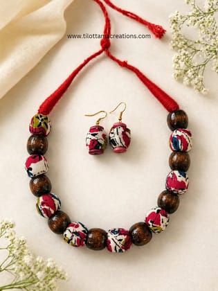Handmade. Unique. Beautiful.Fabric bead necklace set with matching earrings  crafted to make every outfit stand out.