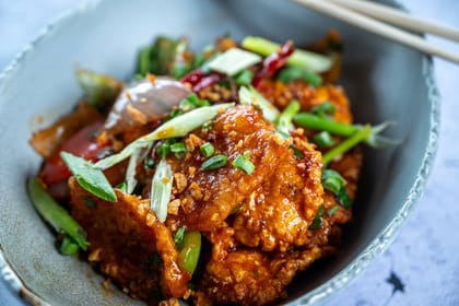Fried Chicken Thai Style Tossed With Coriander Basil And Soy