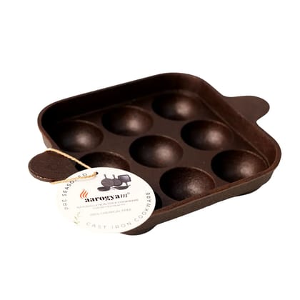 Aarogyam Cast Iron Paniyaram Pan 9 Cavity , with Ring at Bottom for support, Pre-Seasoned 7 inch Diameter (17cm), Naturally Non-stick, Toxin-Free, Gas & Induction Compatible, Weight- 1.7 kg (Colour - Black) by Aarogyam - The Cast Iron Shop